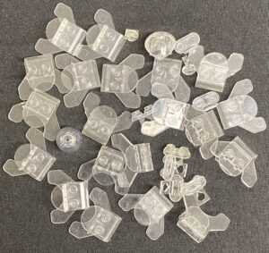 "LEGO Trans Clear Minifigure accessory pack items."