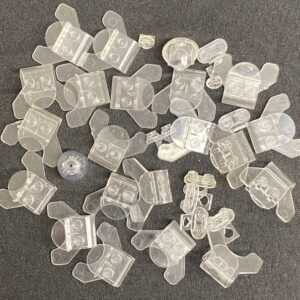 "LEGO Trans Clear Minifigure accessory pack items."